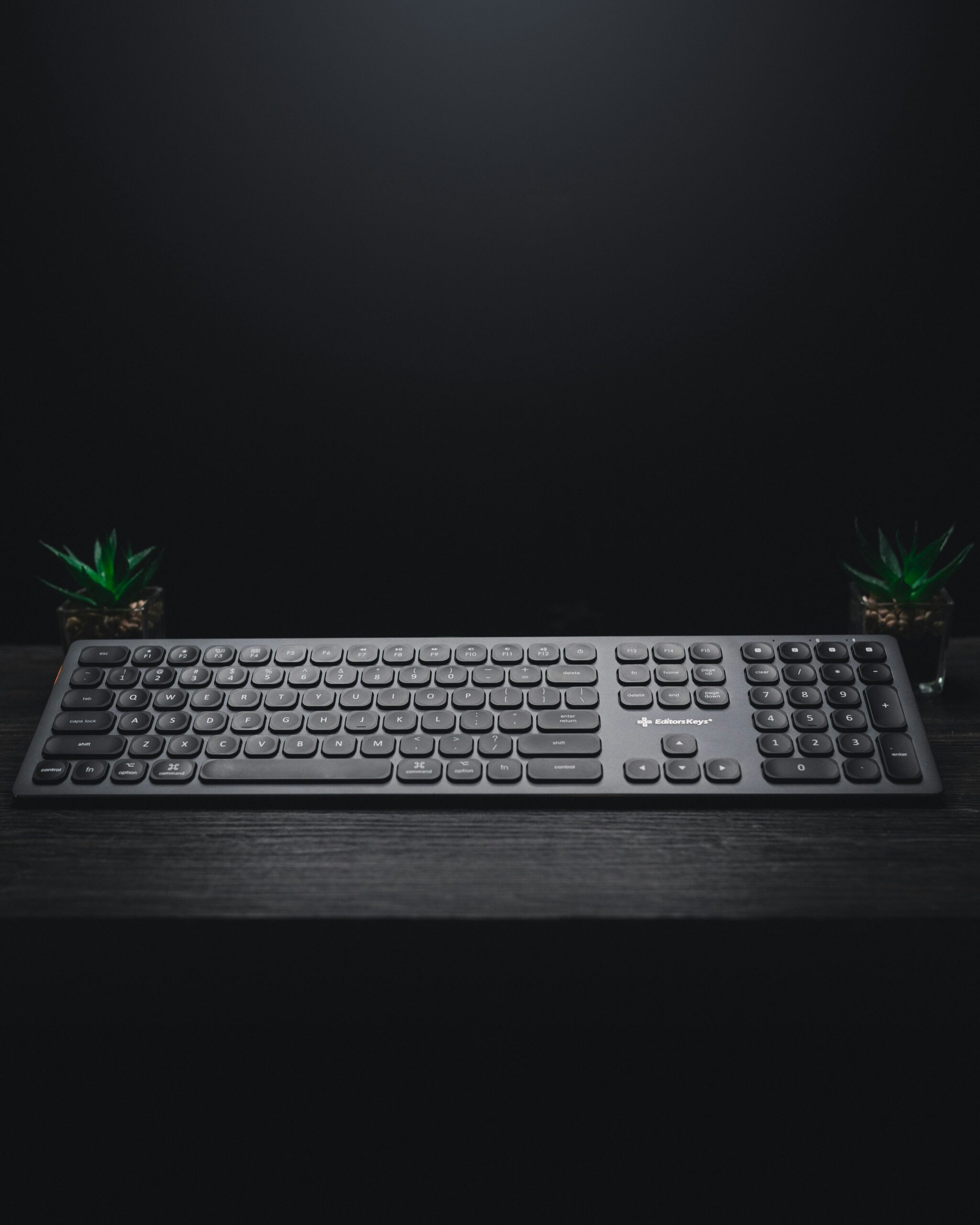 Full-size computer keyboard on a desk