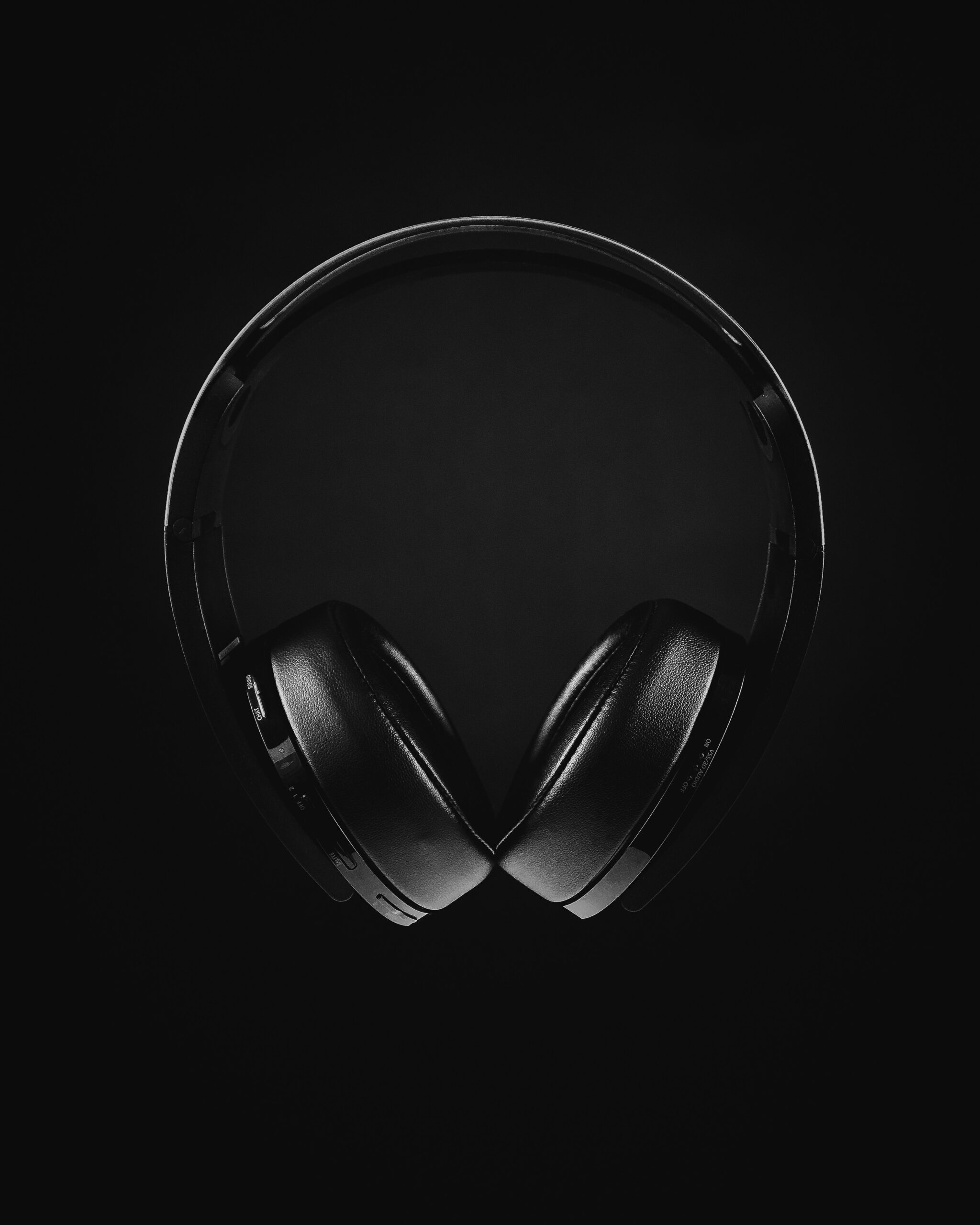 On-ear headphones against a dark background
